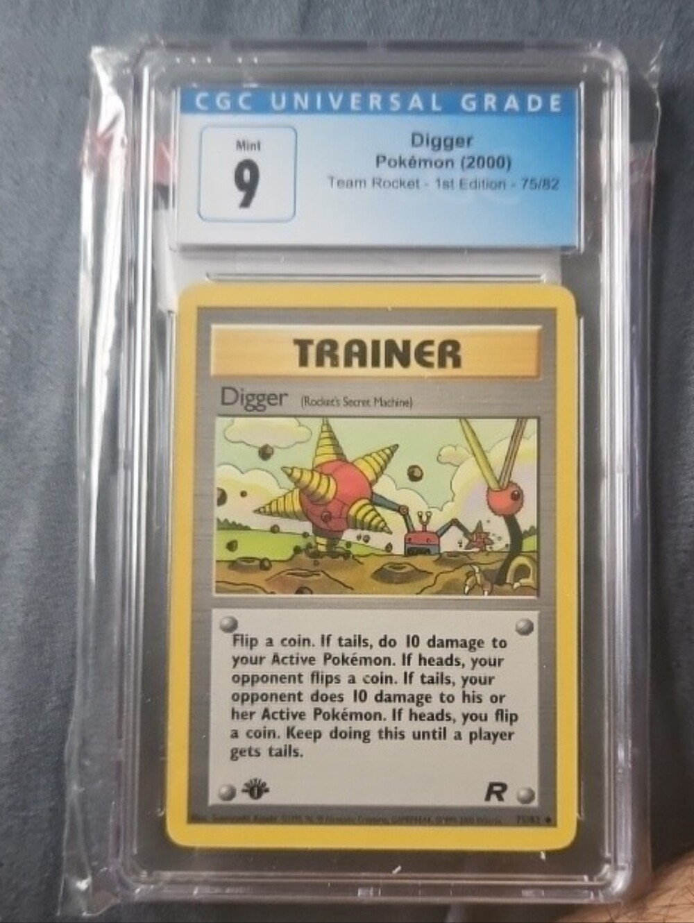 2000 1st Edition Digger (Rocket's Secret Machine) 75/82 Team Rocket Graded CGC 9